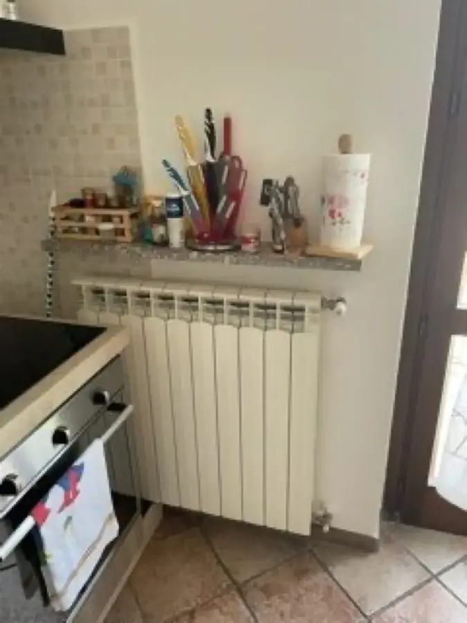 I vecchi termosifoni in ghisa prima della sostituzione